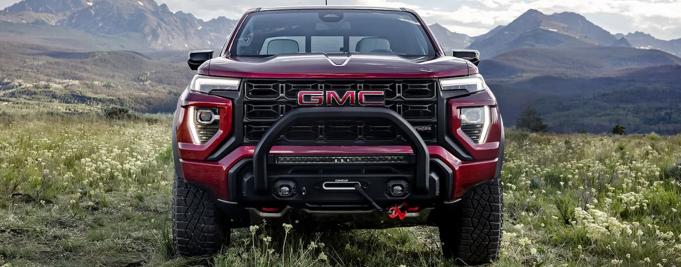 Front and grille on a red 2026 GMC Canyon