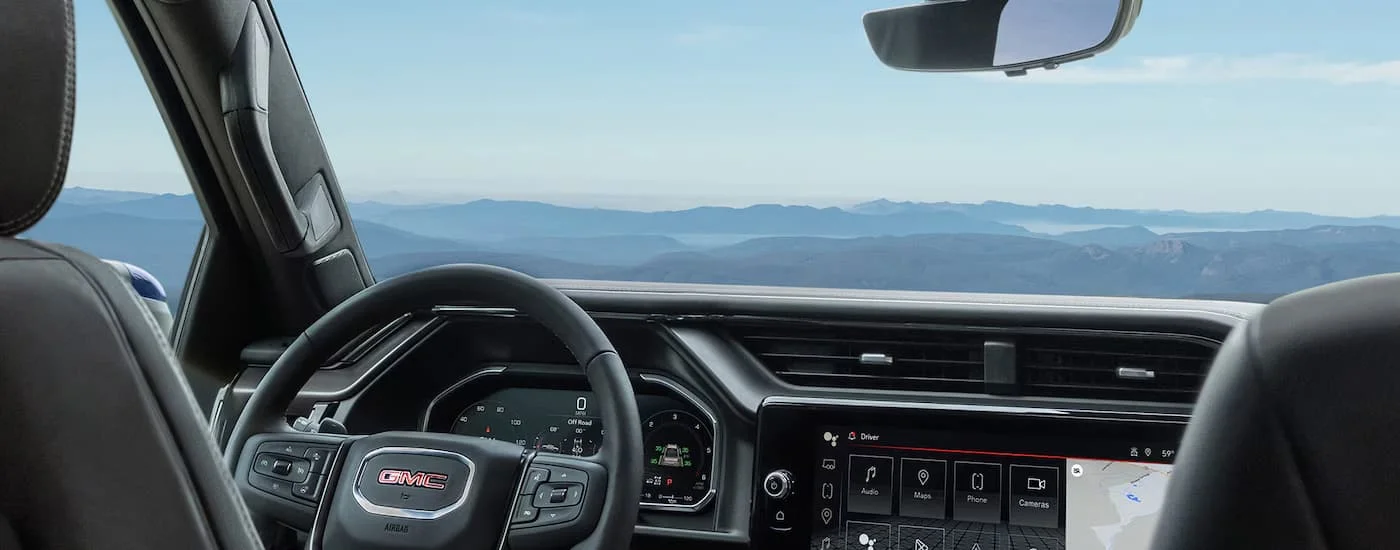 Dashboard and steering wheel in a 2026 GMC Sierra 1500