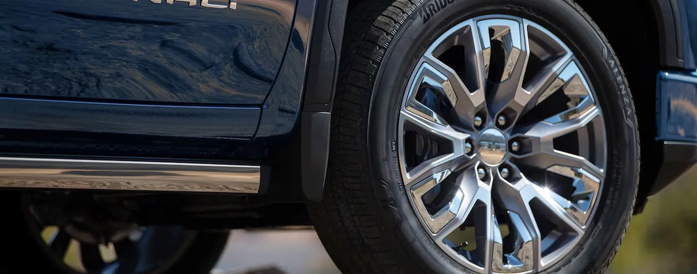 Side and tire on a blue 2025 GMC Sierra 1500