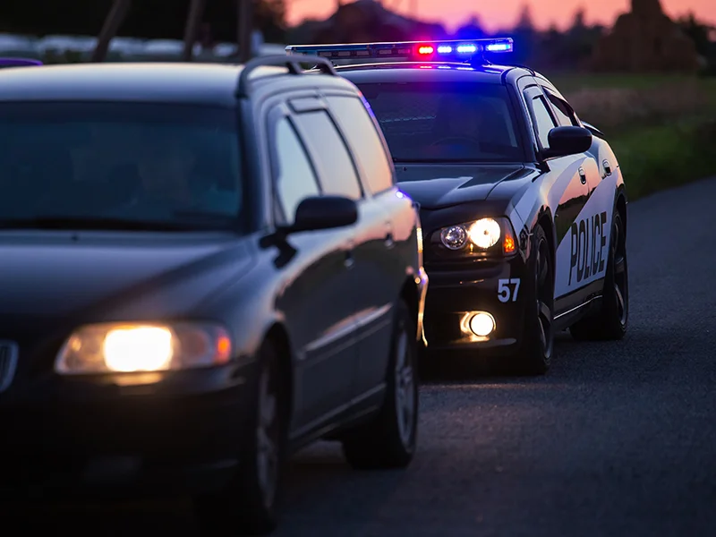 A police car beside the another car